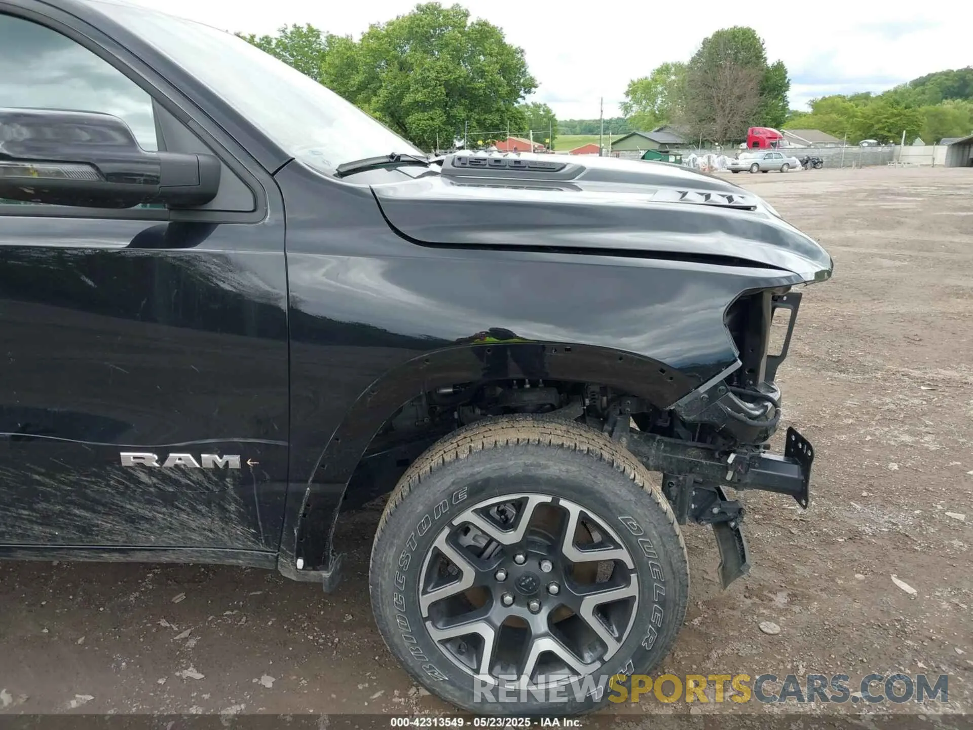 19 Photograph of a damaged car 1C6SRFJPXSN512942 RAM 1500 2025