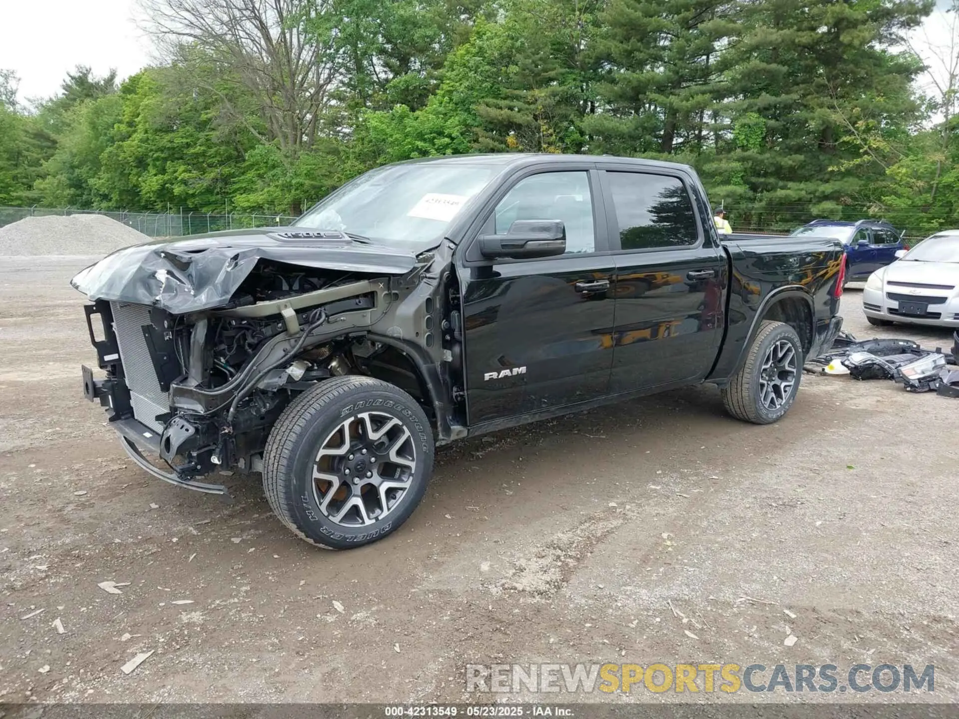 2 Photograph of a damaged car 1C6SRFJPXSN512942 RAM 1500 2025