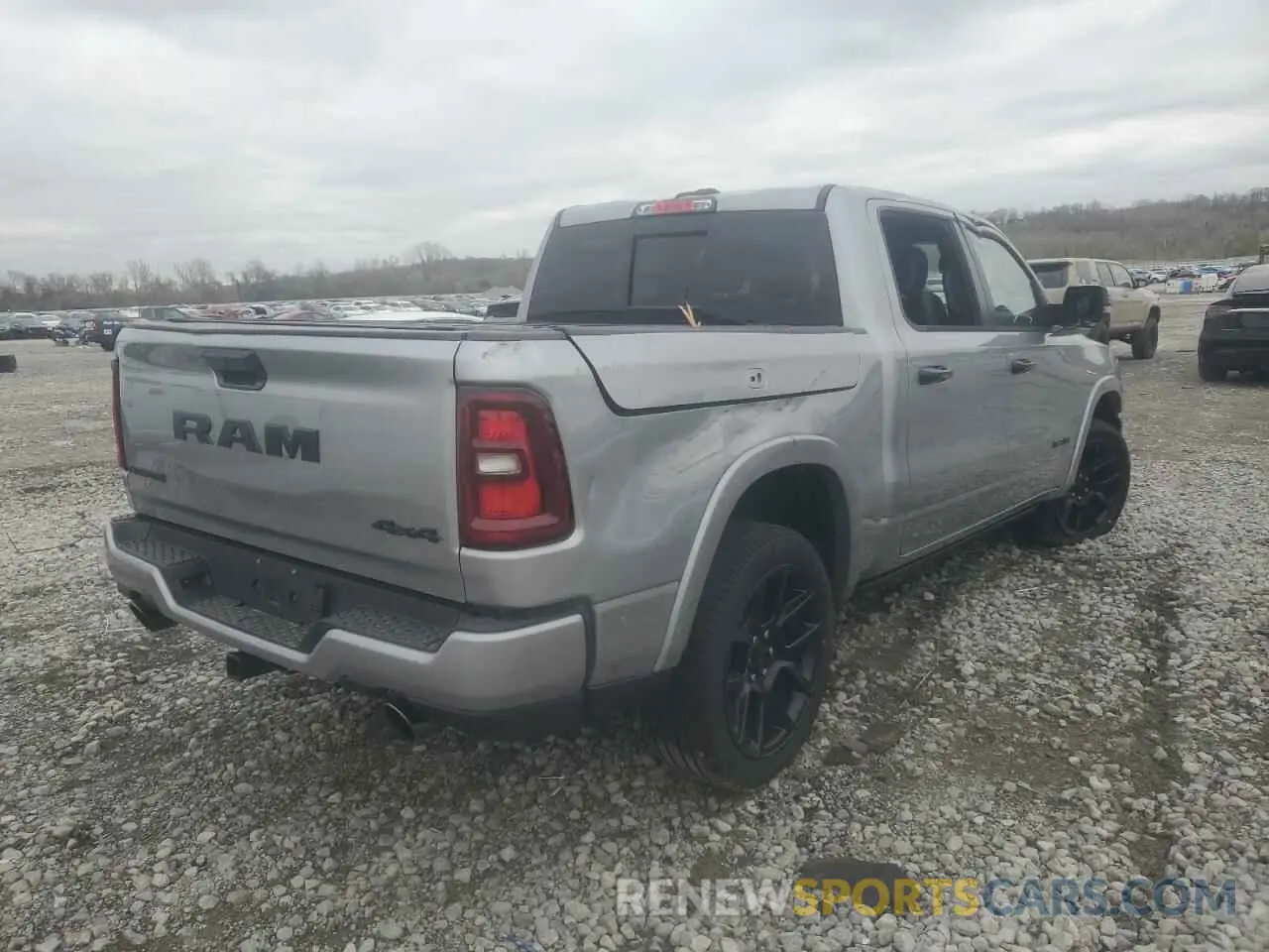3 Photograph of a damaged car 1C6SRFJPXSN627105 RAM 1500 2025