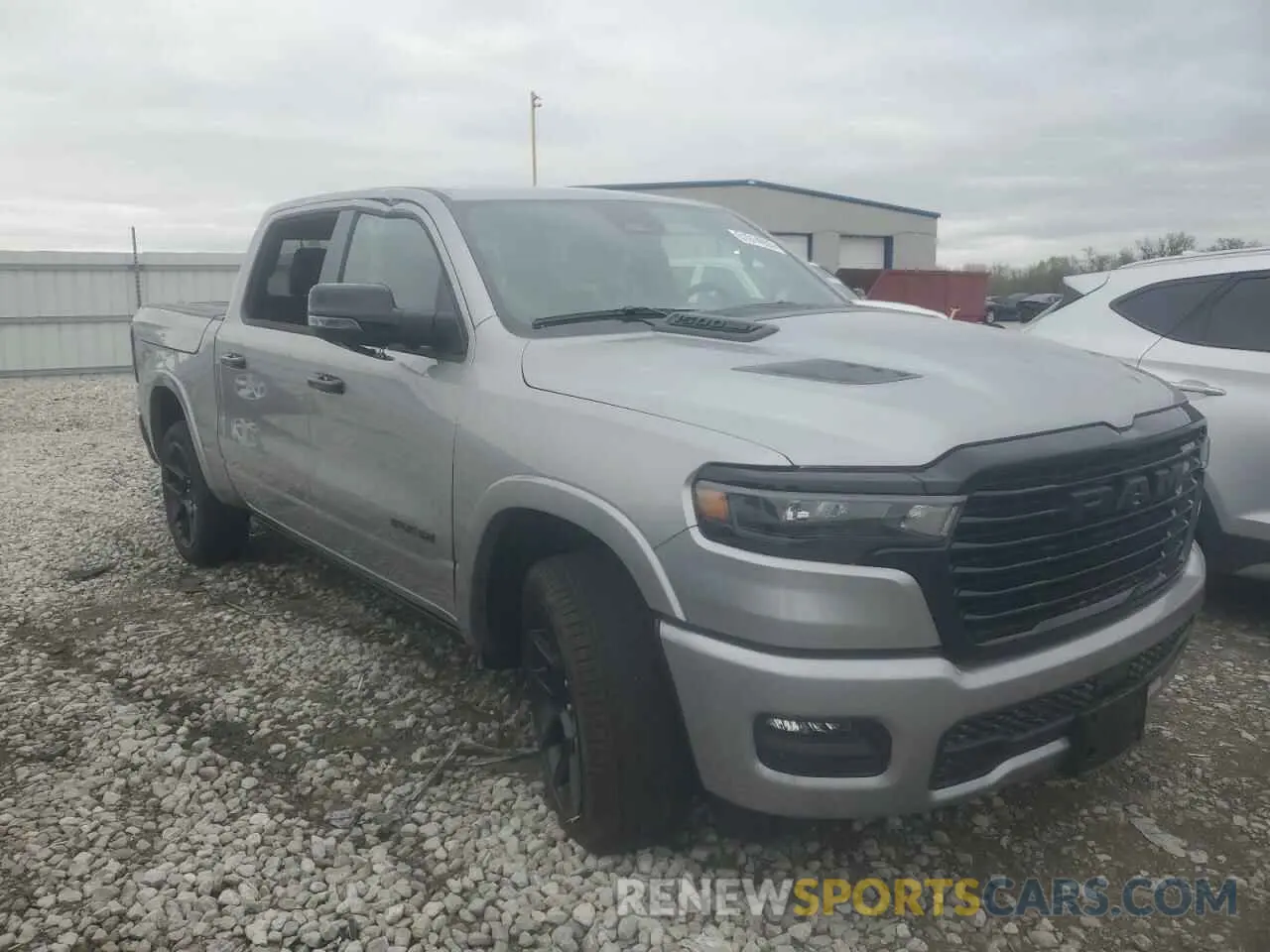 4 Photograph of a damaged car 1C6SRFJPXSN627105 RAM 1500 2025