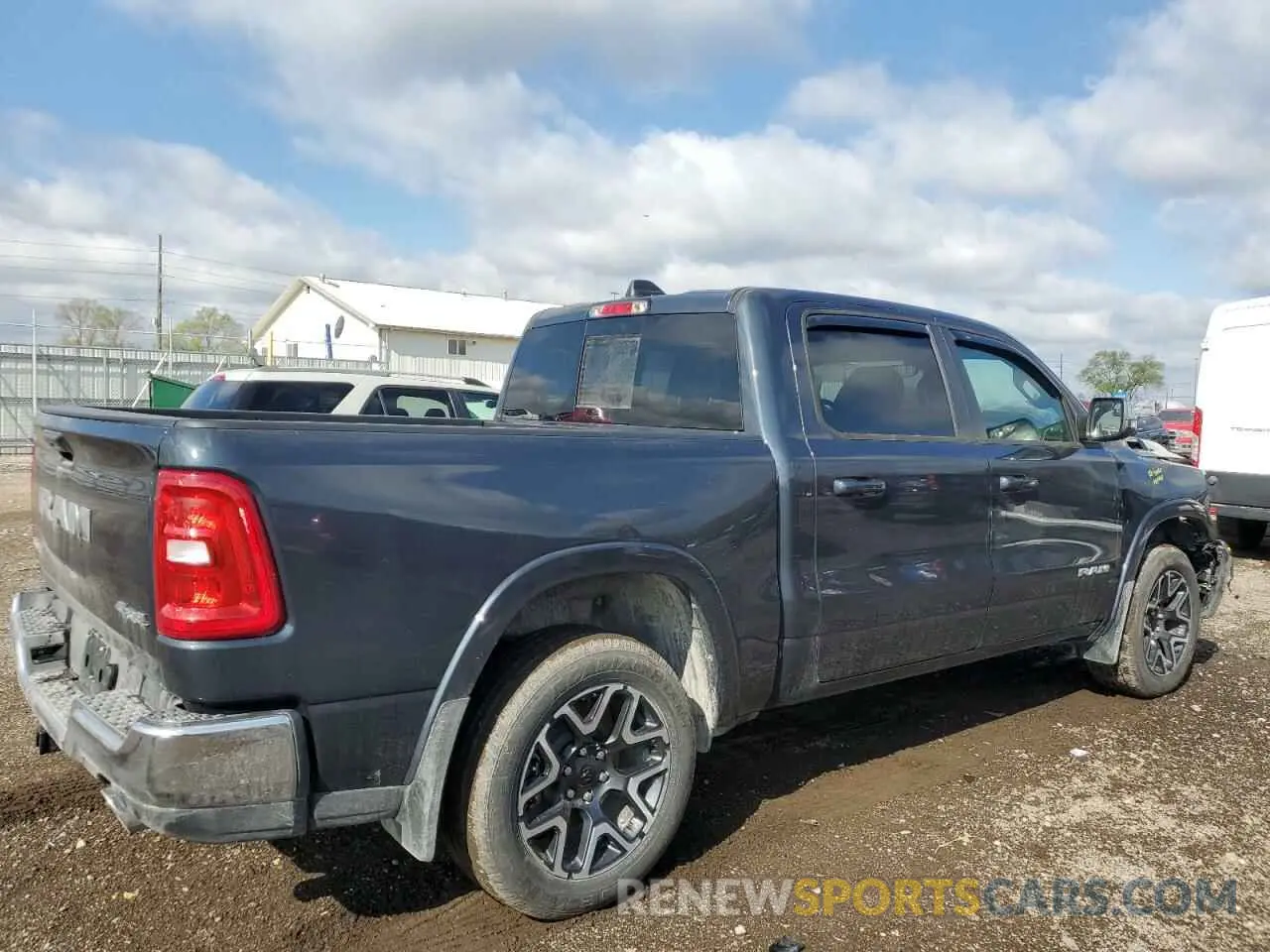 3 Photograph of a damaged car 1C6SRFJPXSN655602 RAM 1500 2025