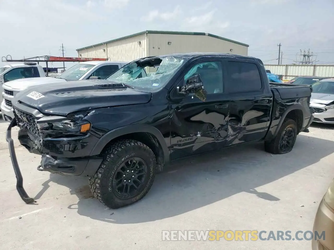 1 Photograph of a damaged car 1C6SRFLP8SN593646 RAM 1500 2025