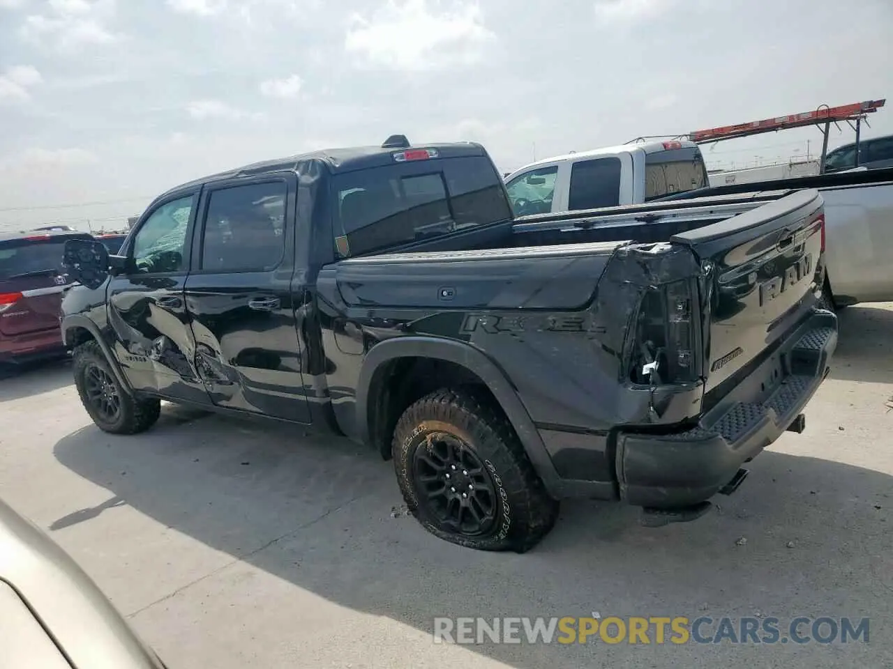 2 Photograph of a damaged car 1C6SRFLP8SN593646 RAM 1500 2025