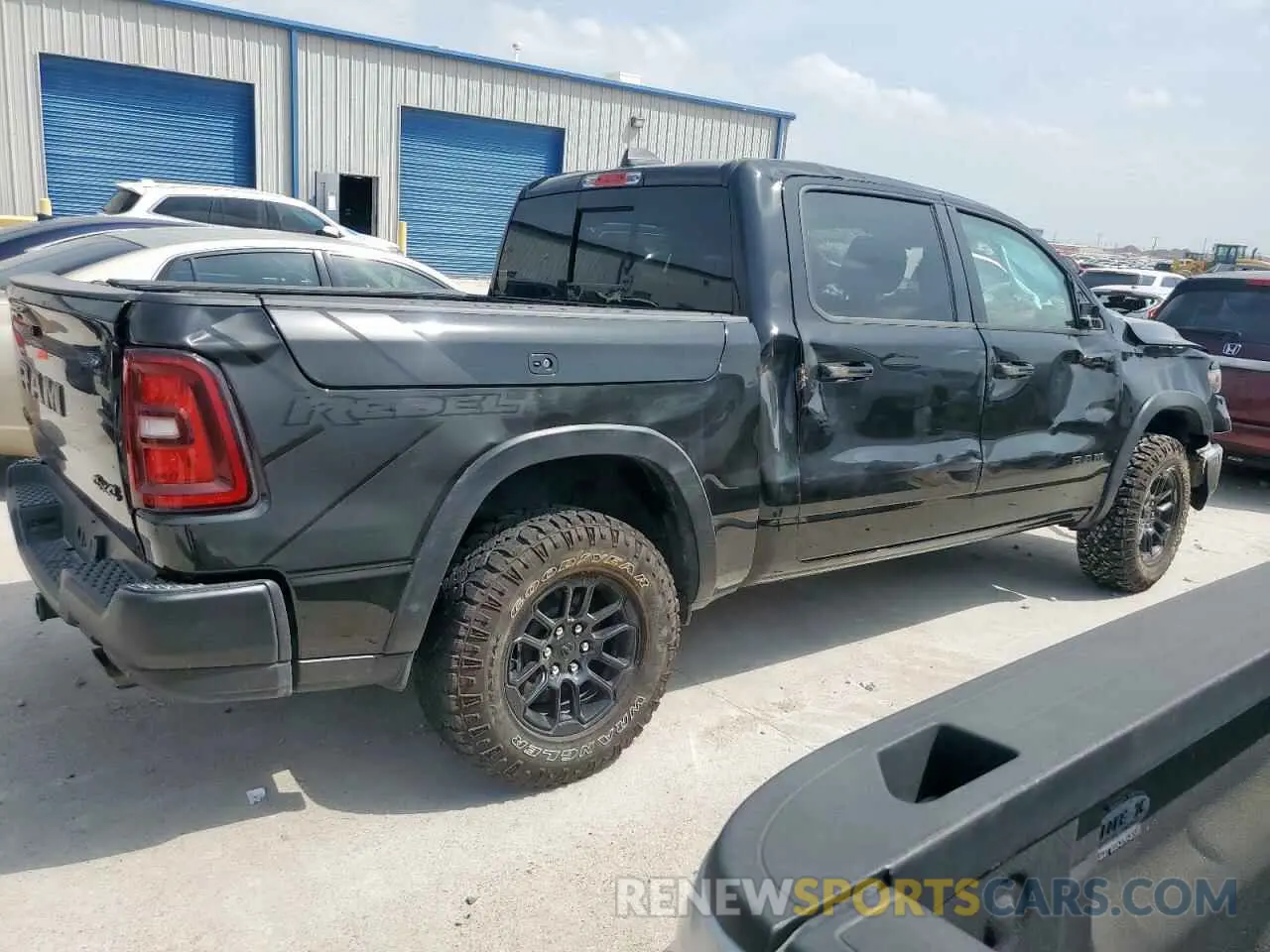 3 Photograph of a damaged car 1C6SRFLP8SN593646 RAM 1500 2025