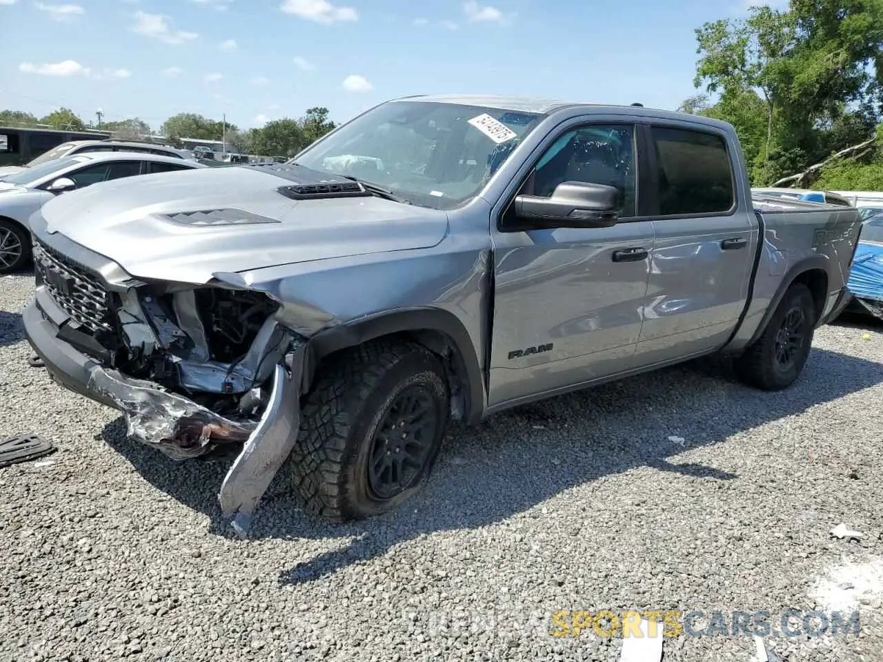 1 Photograph of a damaged car 1C6SRFLPXSN583815 RAM 1500 2025