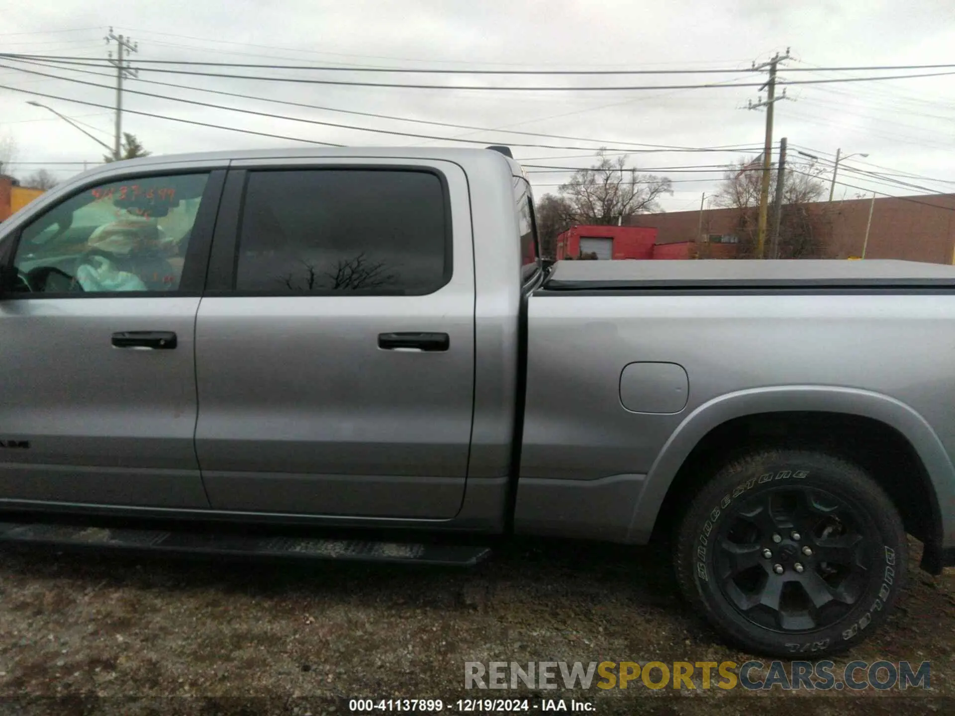 14 Photograph of a damaged car 1C6SRFMP0SN519412 RAM 1500 2025
