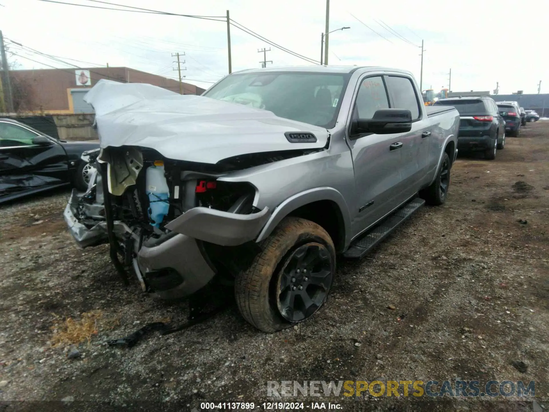2 Photograph of a damaged car 1C6SRFMP0SN519412 RAM 1500 2025