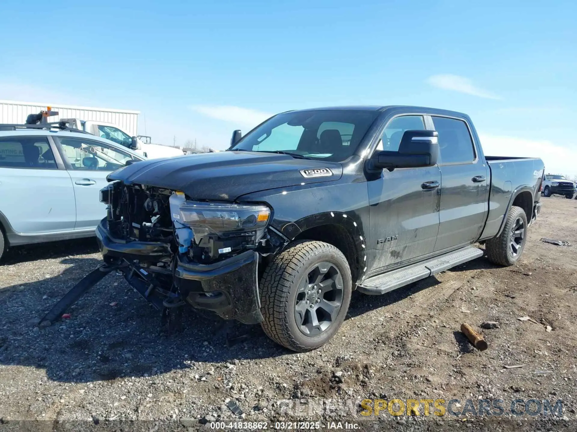 2 Photograph of a damaged car 1C6SRFMP2SN658960 RAM 1500 2025