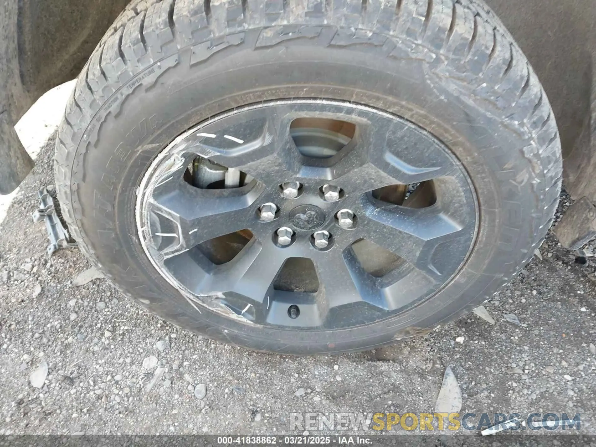 21 Photograph of a damaged car 1C6SRFMP2SN658960 RAM 1500 2025