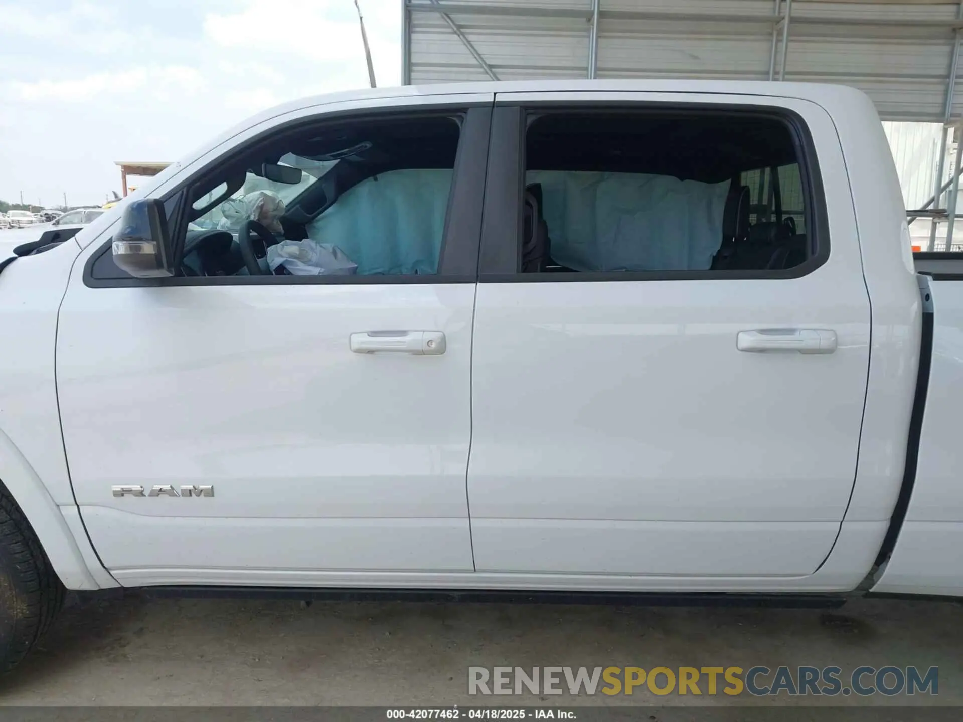 14 Photograph of a damaged car 1C6SRFRP3SN538769 RAM 1500 2025