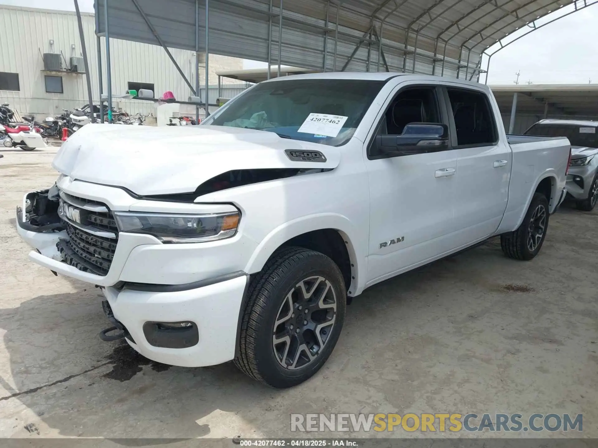 2 Photograph of a damaged car 1C6SRFRP3SN538769 RAM 1500 2025