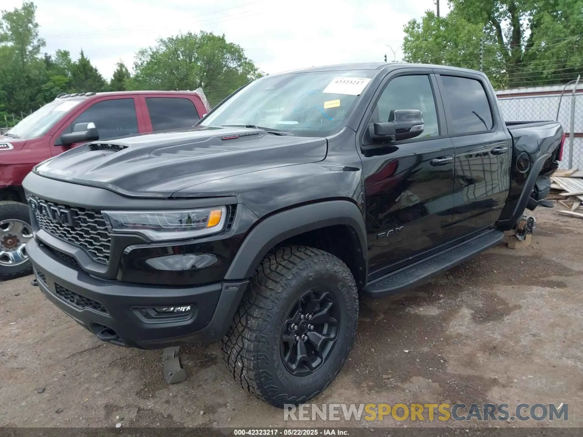 2 Photograph of a damaged car 1C6SRFUP7SN668299 RAM 1500 2025