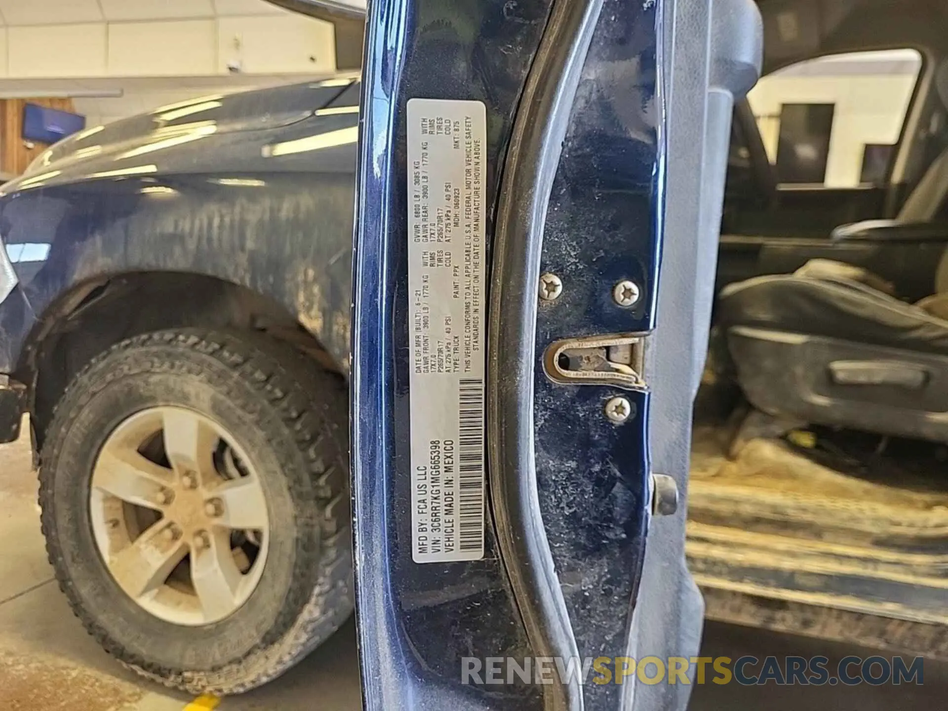 50 Photograph of a damaged car 3C6RR7KG1MG665398 RAM 1500 CLASSIC 2021