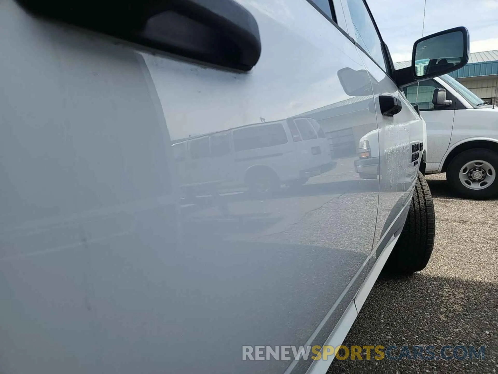 4 Photograph of a damaged car 1C6RR7ST3NS210589 RAM 1500 CLASSIC 2022