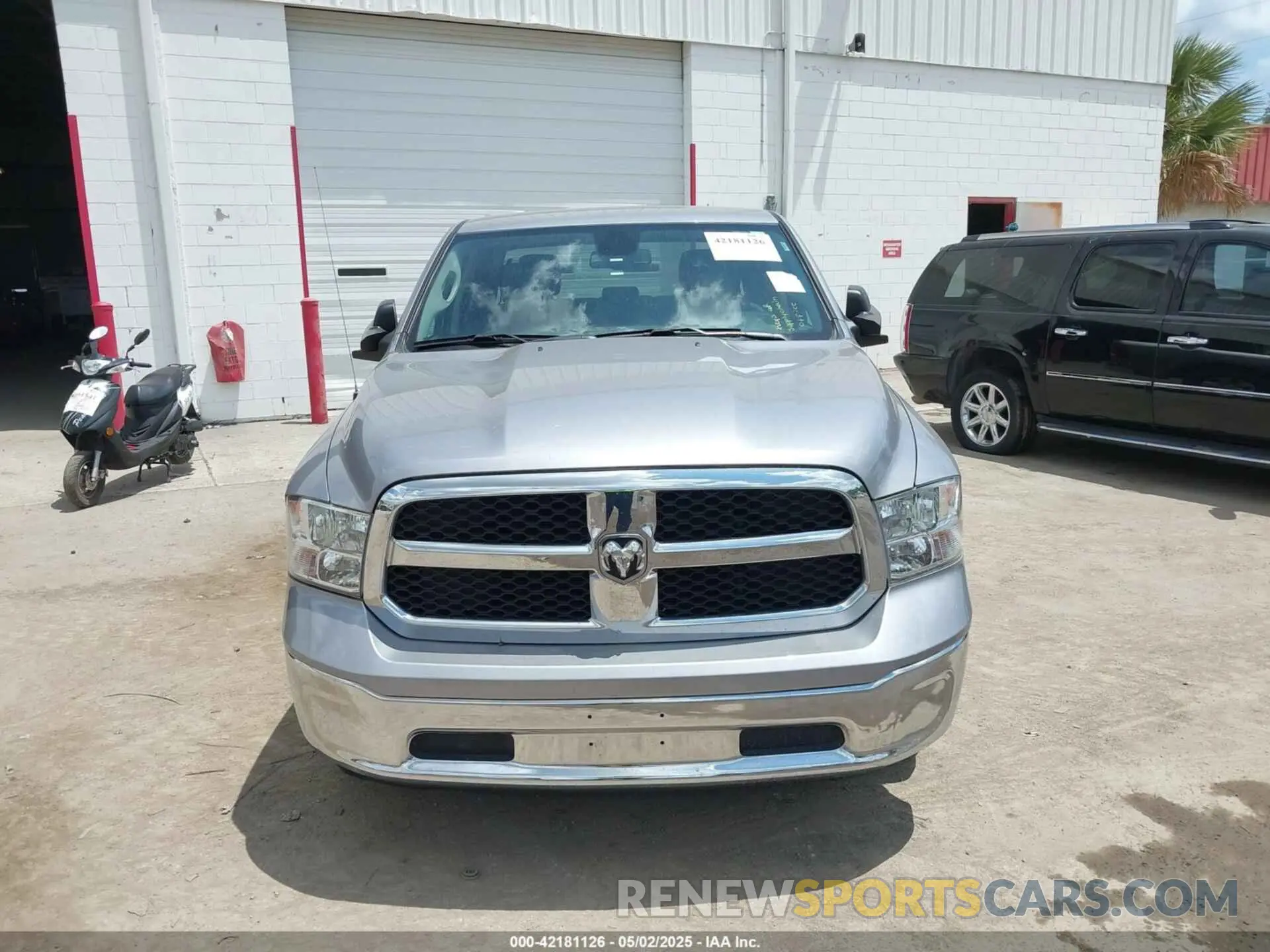 12 Photograph of a damaged car 1C6RR6LG9PS564888 RAM 1500 CLASSIC 2023