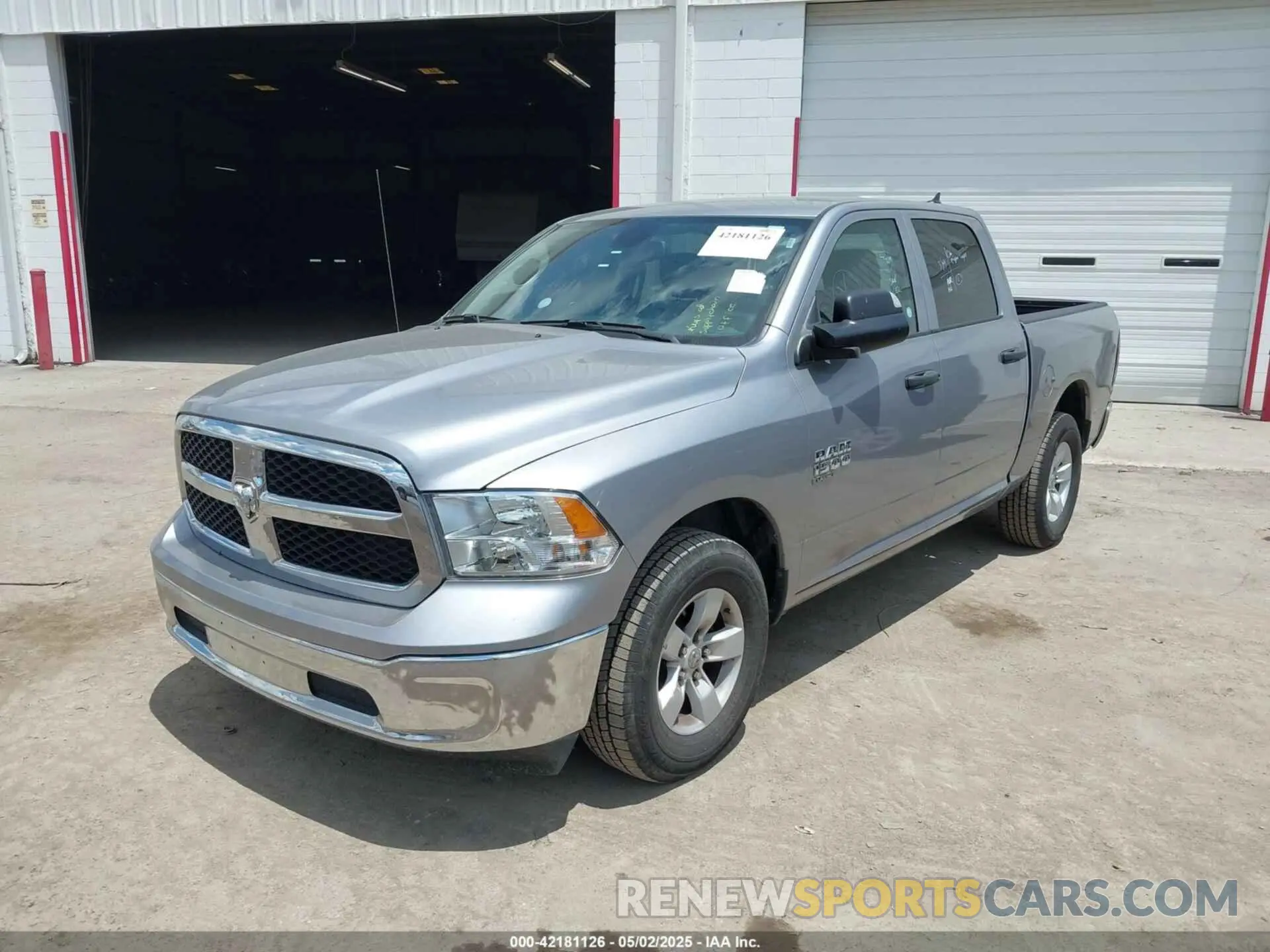 2 Photograph of a damaged car 1C6RR6LG9PS564888 RAM 1500 CLASSIC 2023