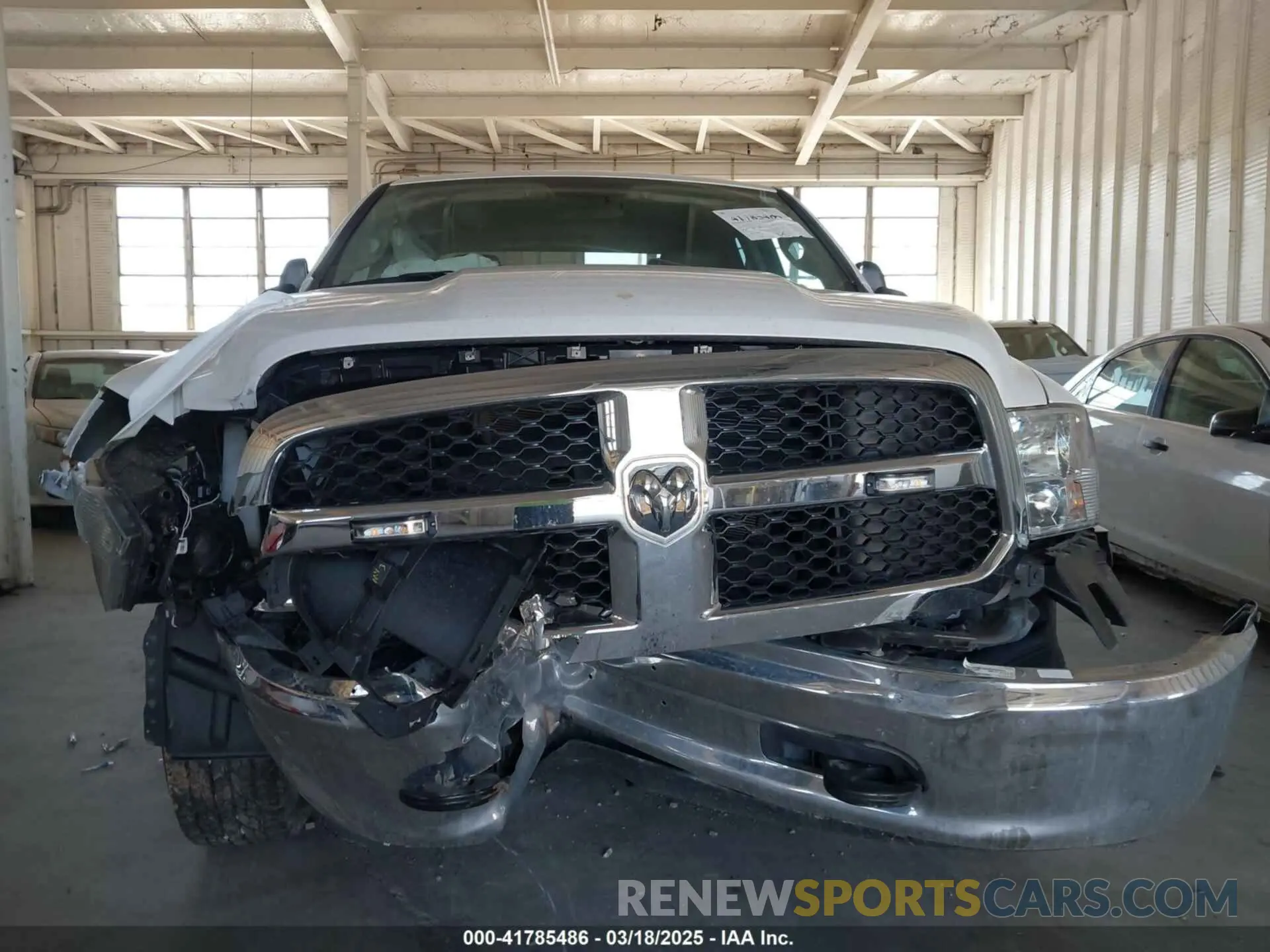 12 Photograph of a damaged car 1C6RR7FG1PS589091 RAM 1500 CLASSIC 2023