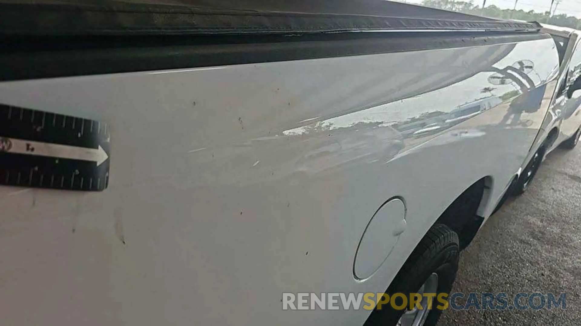 21 Photograph of a damaged car 3C6JR6DG6PG541121 RAM 1500 CLASSIC 2023