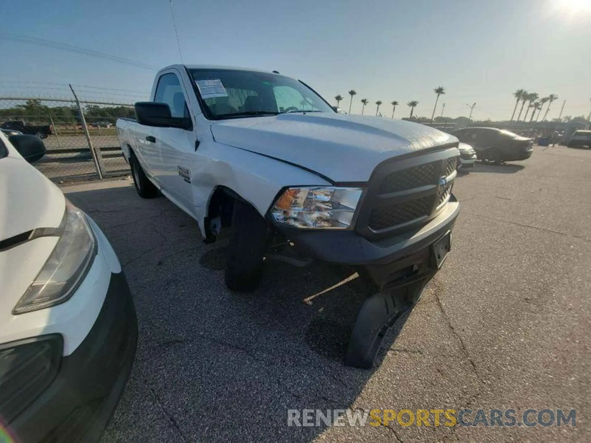 19 Photograph of a damaged car 3C6JR6DG9PG541100 RAM 1500 CLASSIC 2023