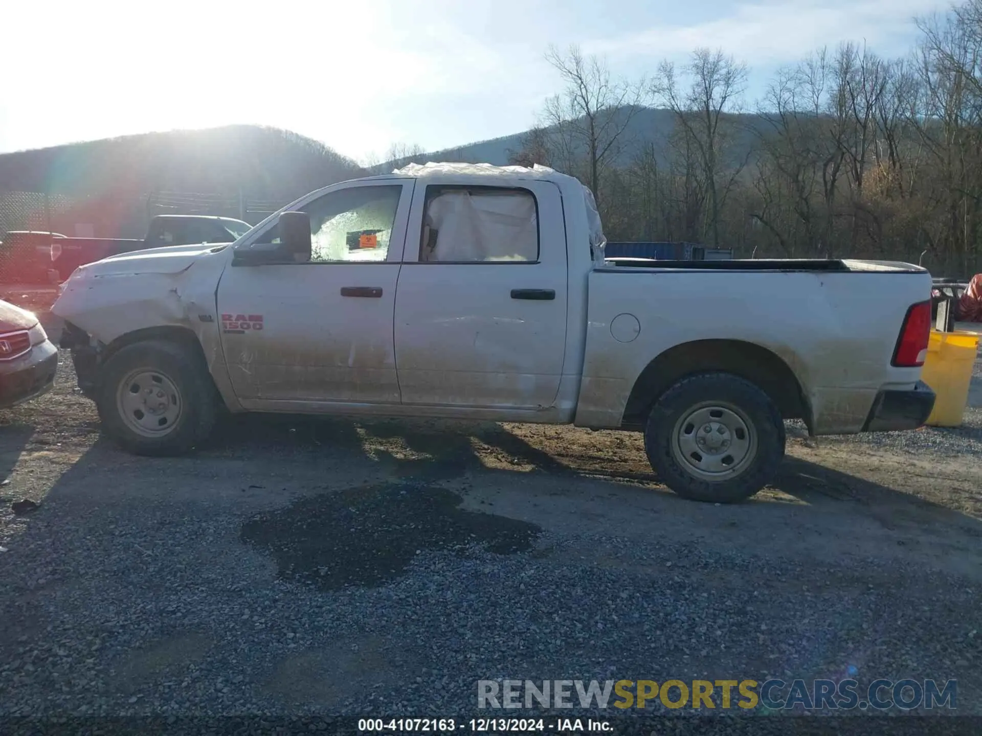 13 Photograph of a damaged car 3C6RR7KT7PG641320 RAM 1500 CLASSIC 2023