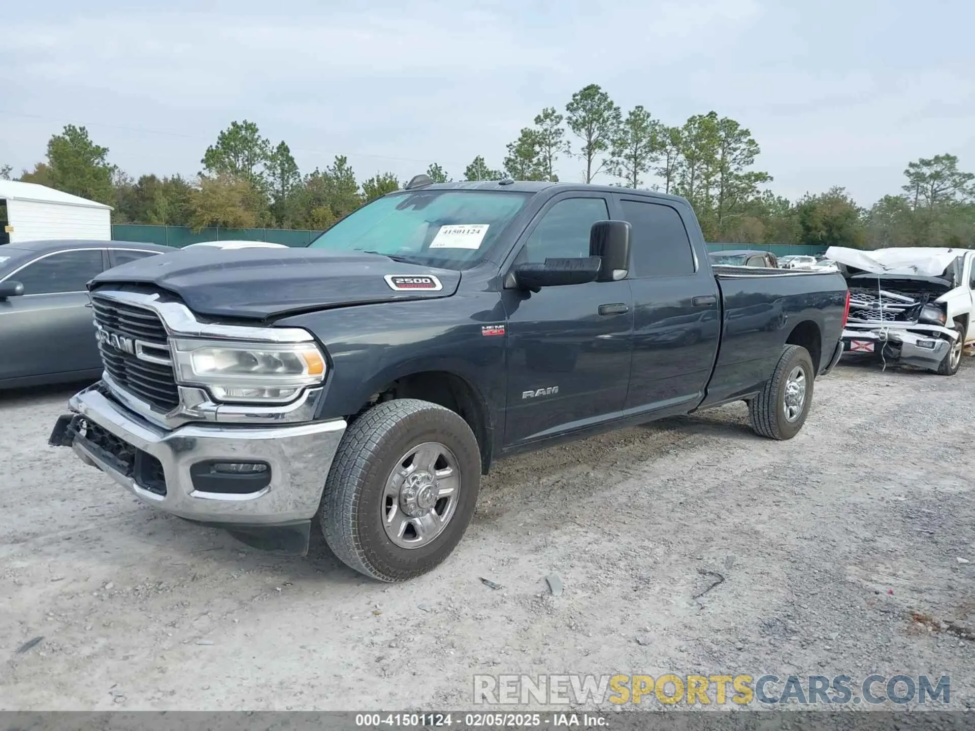 2 Photograph of a damaged car 3C6UR4HJ3KG712732 RAM 2500 2019