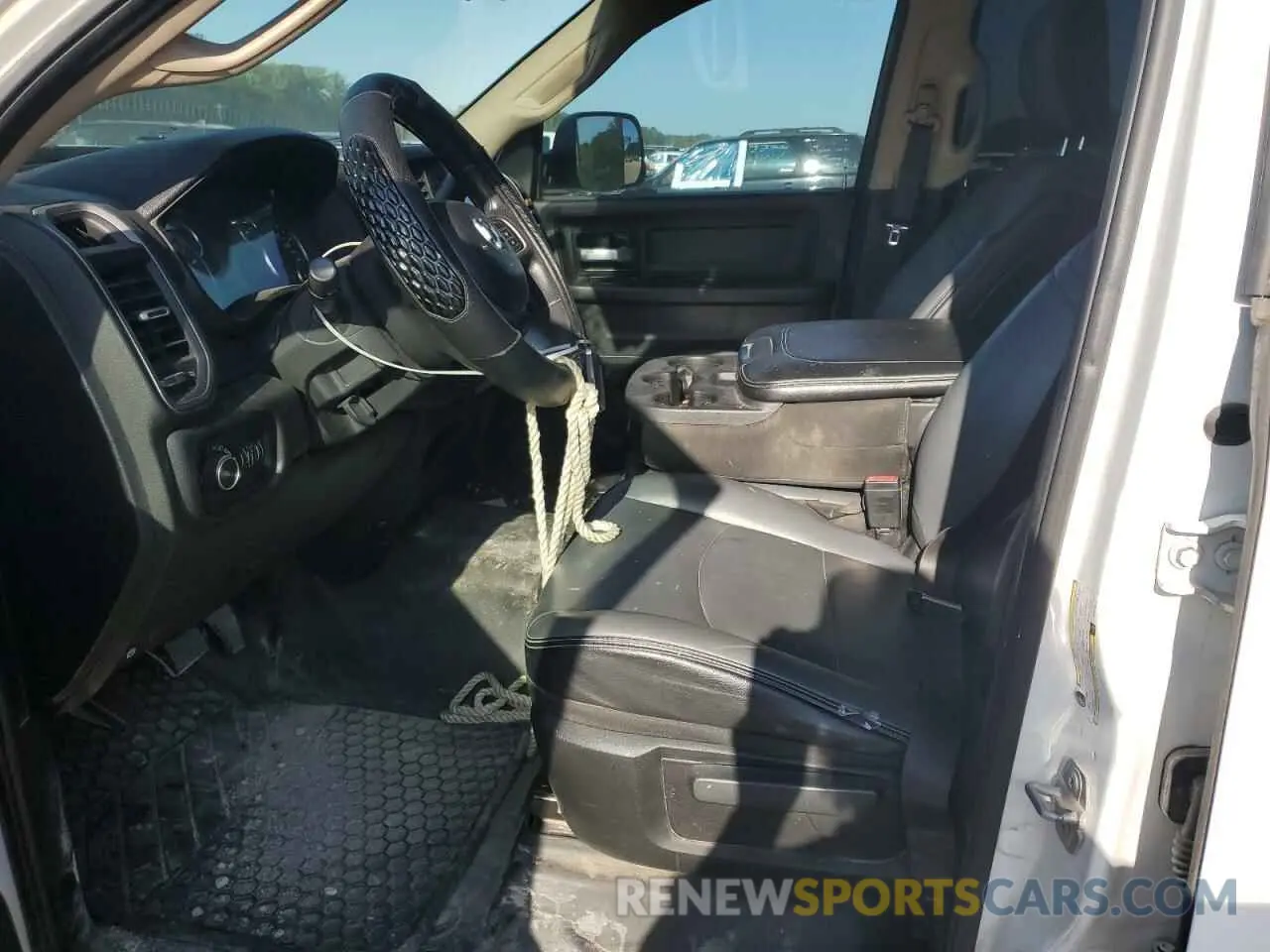 7 Photograph of a damaged car 3C6UR4HL4KG576211 RAM 2500 2019