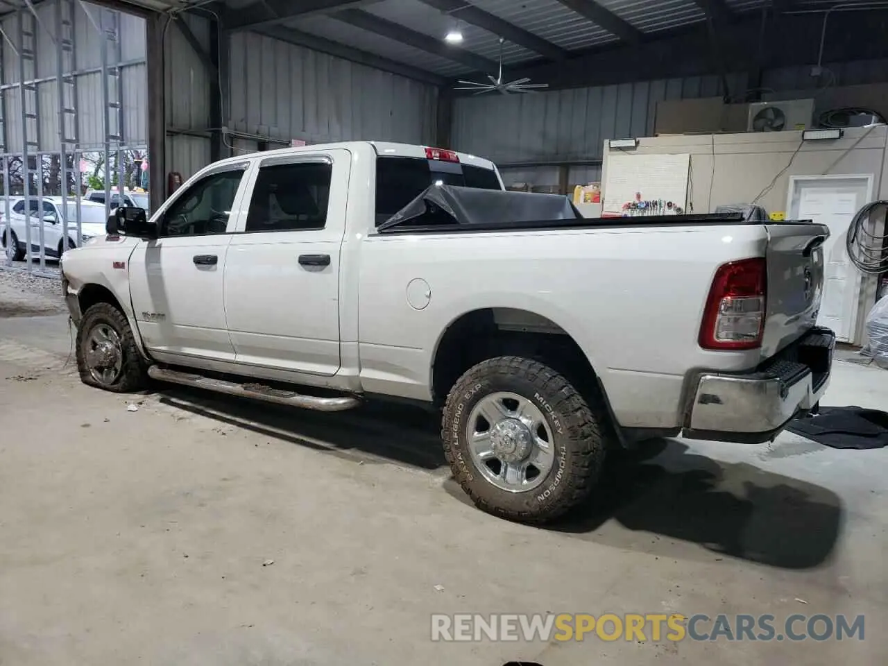 2 Photograph of a damaged car 3C6UR5CJ0KG633399 RAM 2500 2019