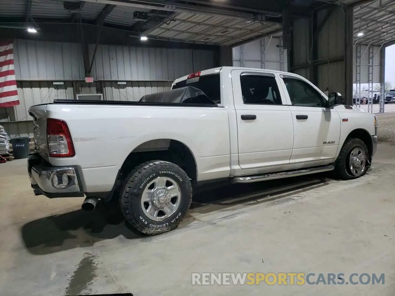 3 Photograph of a damaged car 3C6UR5CJ0KG633399 RAM 2500 2019