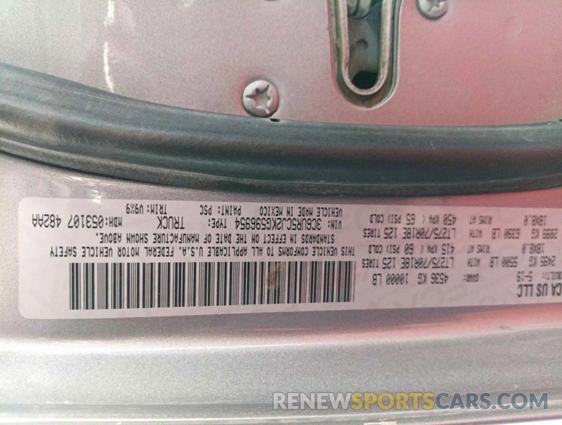 10 Photograph of a damaged car 3C6UR5CJ2KG596954 RAM 2500 2019