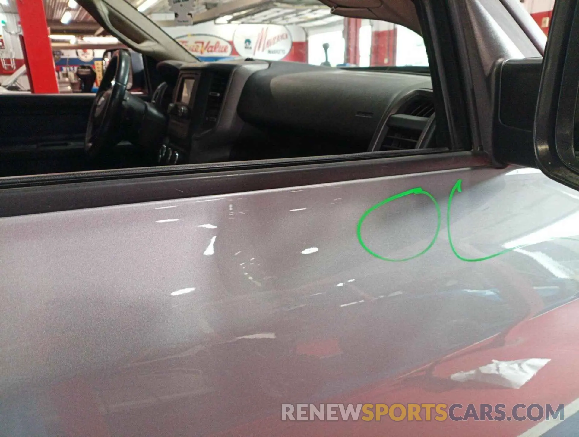 12 Photograph of a damaged car 3C6UR5CJ2KG596954 RAM 2500 2019