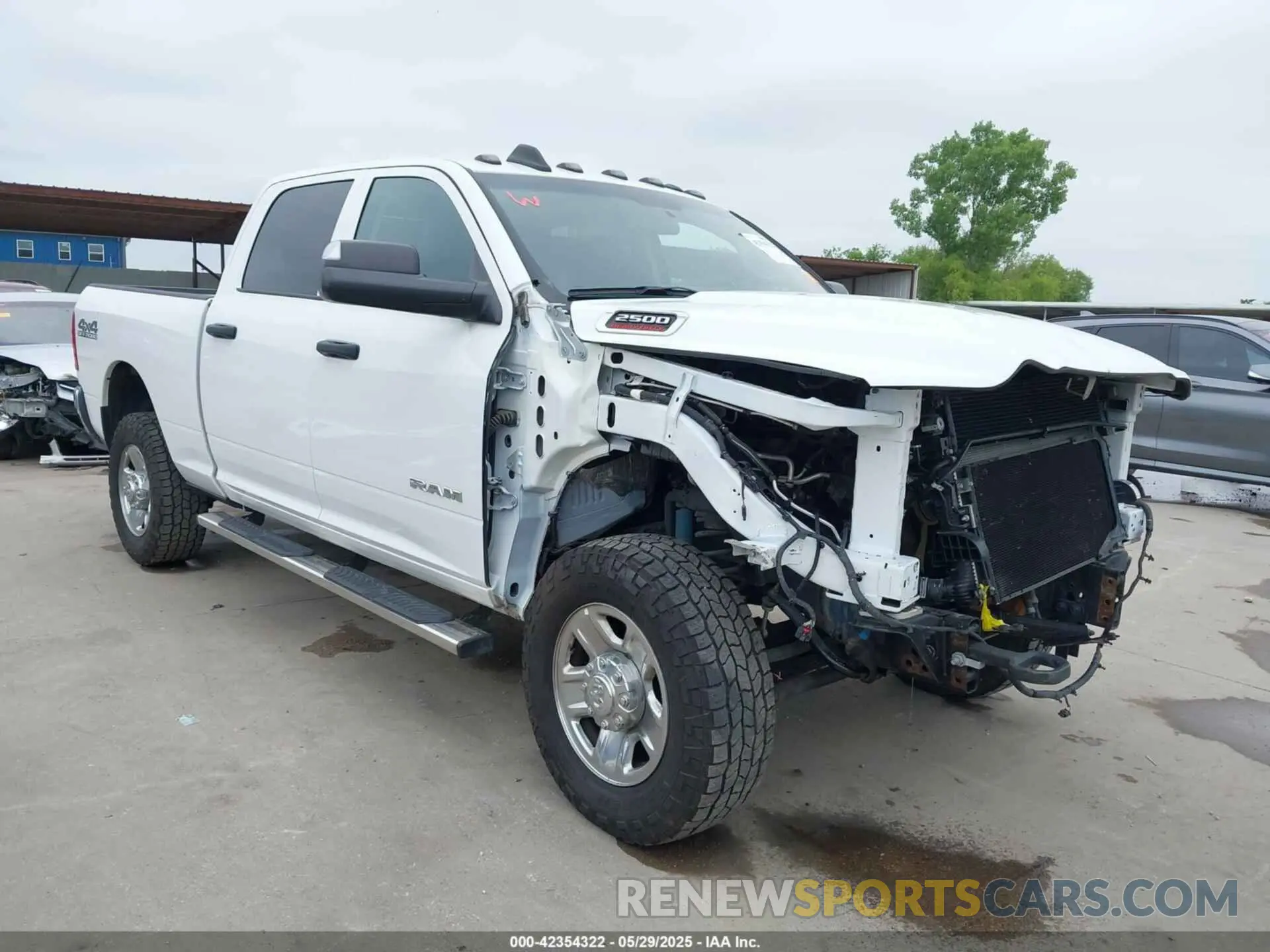 1 Photograph of a damaged car 3C6UR5CJ3KG512575 RAM 2500 2019