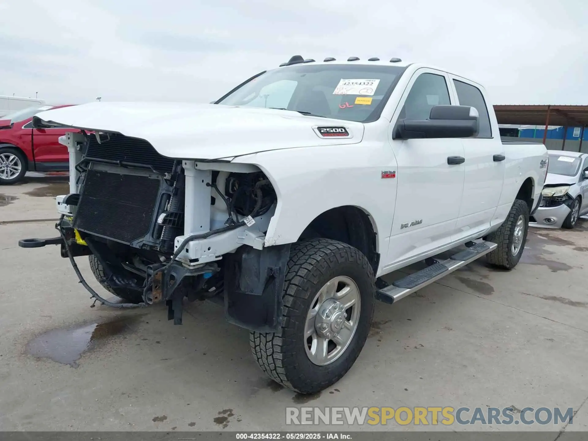 2 Photograph of a damaged car 3C6UR5CJ3KG512575 RAM 2500 2019