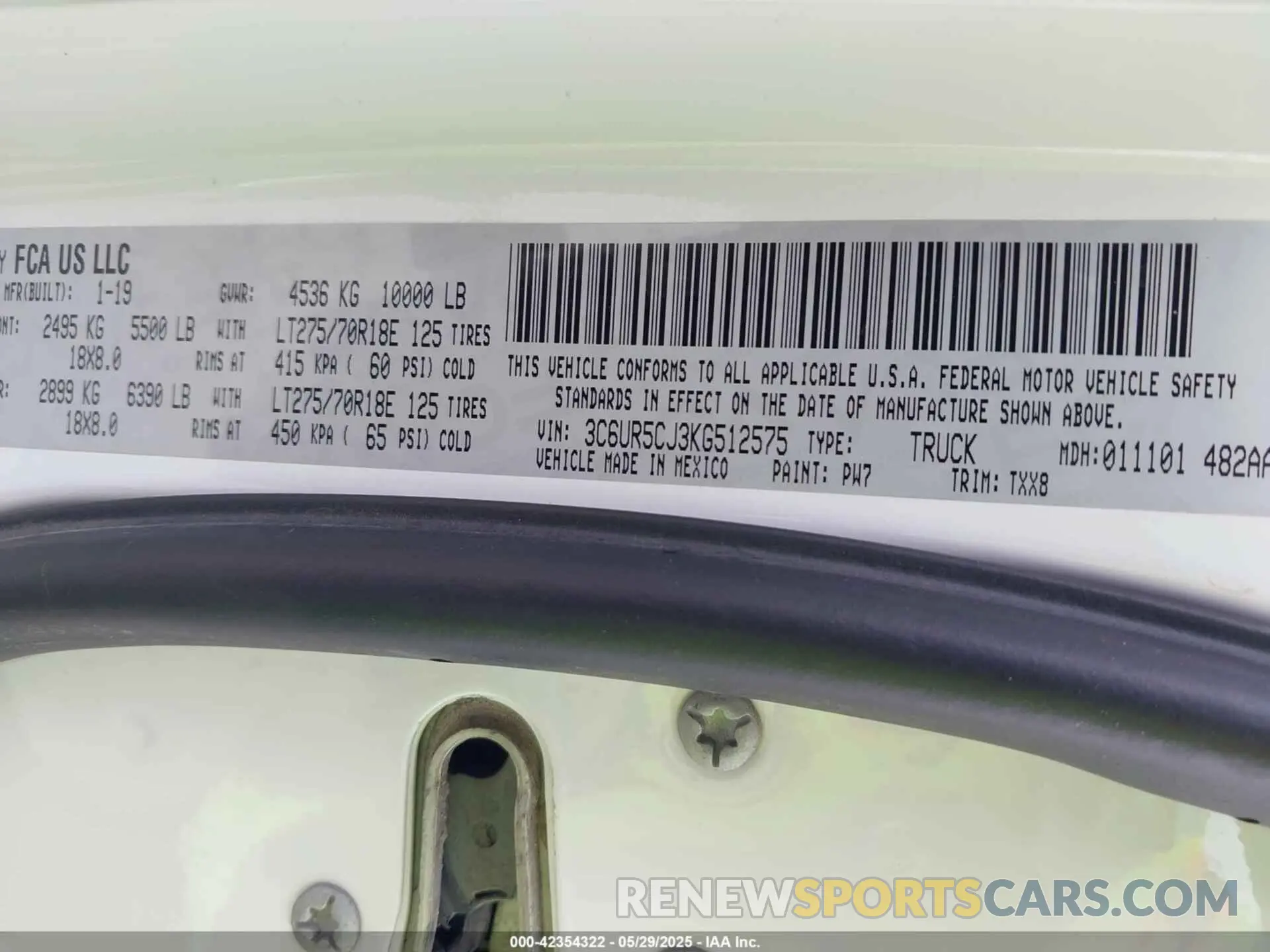 9 Photograph of a damaged car 3C6UR5CJ3KG512575 RAM 2500 2019