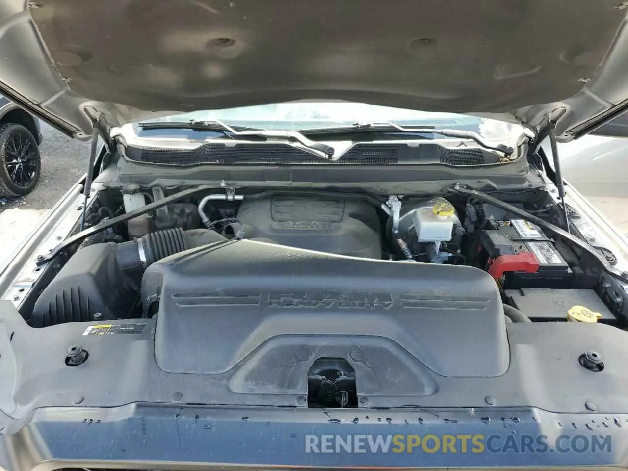 11 Photograph of a damaged car 3C6UR5CJ3KG556303 RAM 2500 2019