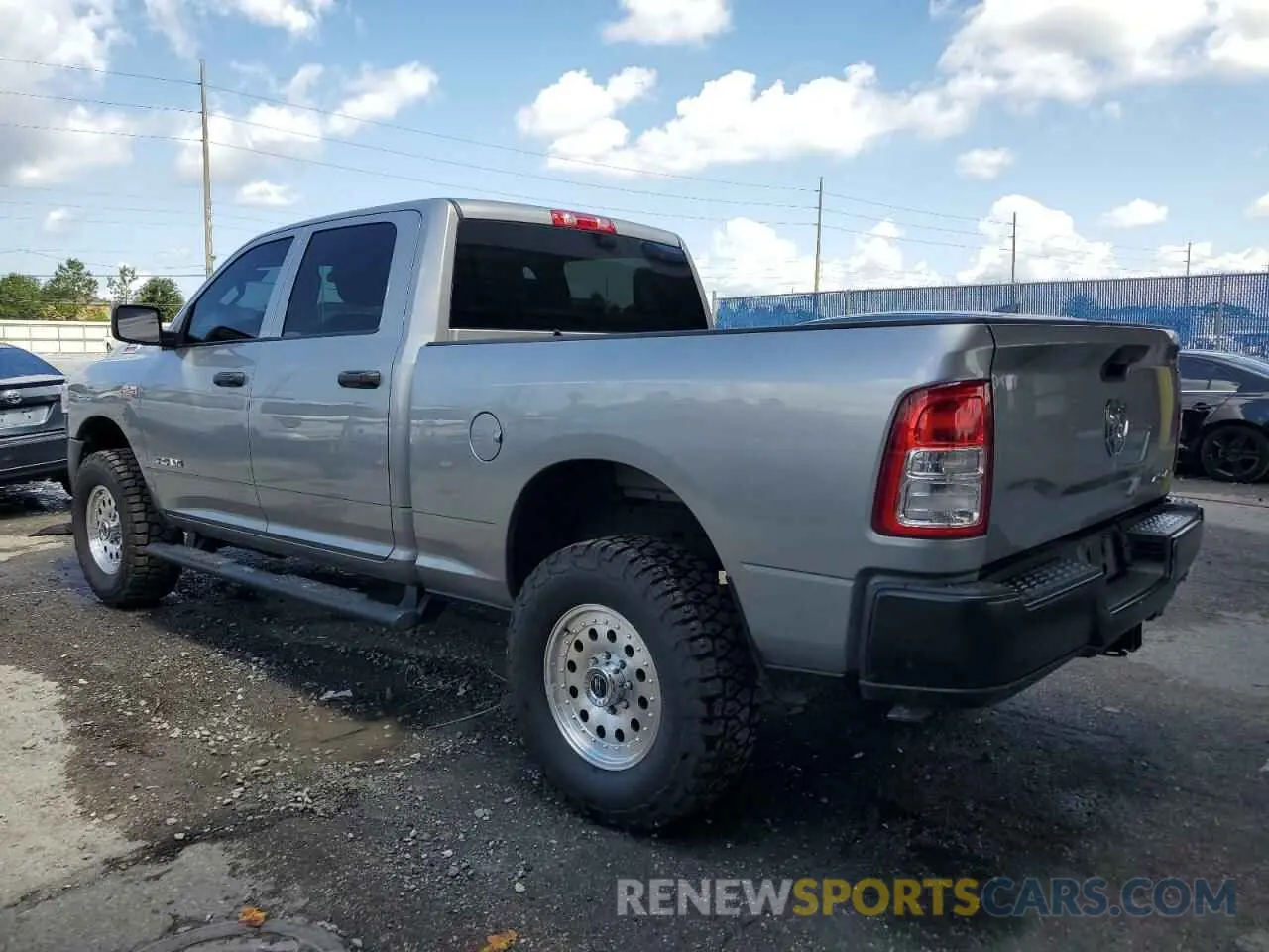 2 Photograph of a damaged car 3C6UR5CJ3KG556303 RAM 2500 2019