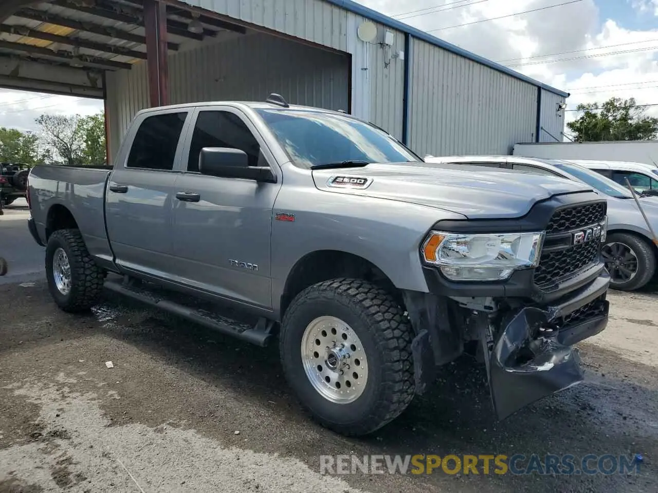 4 Photograph of a damaged car 3C6UR5CJ3KG556303 RAM 2500 2019