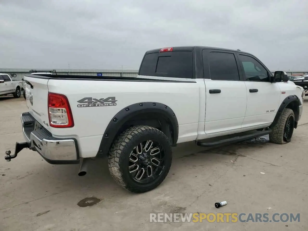 3 Photograph of a damaged car 3C6UR5CJ4KG667037 RAM 2500 2019