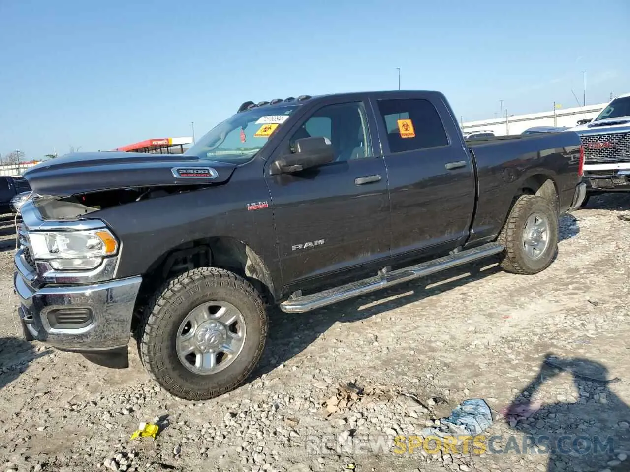 1 Photograph of a damaged car 3C6UR5CJ6KG553668 RAM 2500 2019