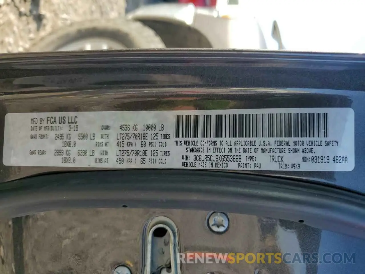 12 Photograph of a damaged car 3C6UR5CJ6KG553668 RAM 2500 2019