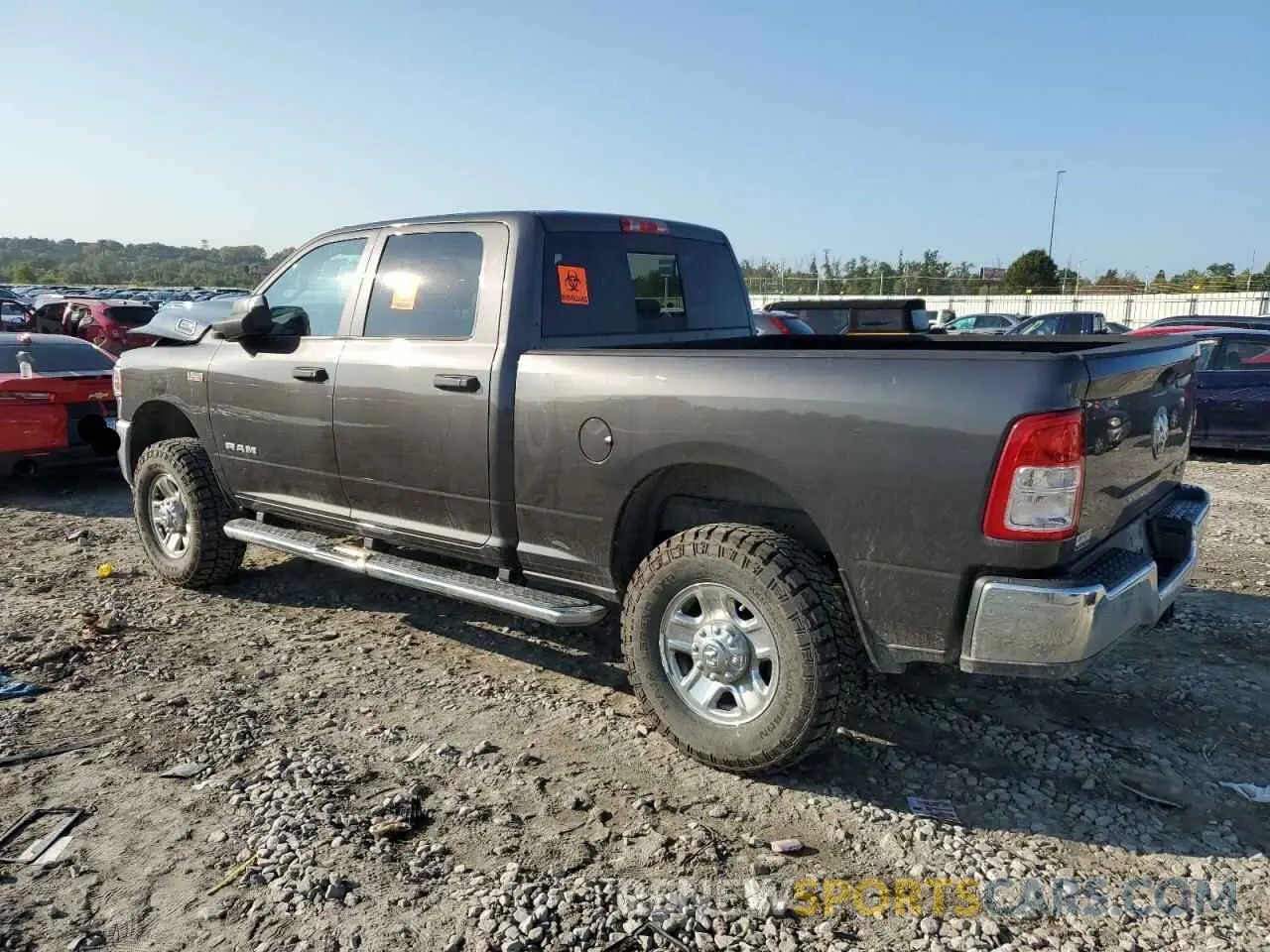 2 Photograph of a damaged car 3C6UR5CJ6KG553668 RAM 2500 2019