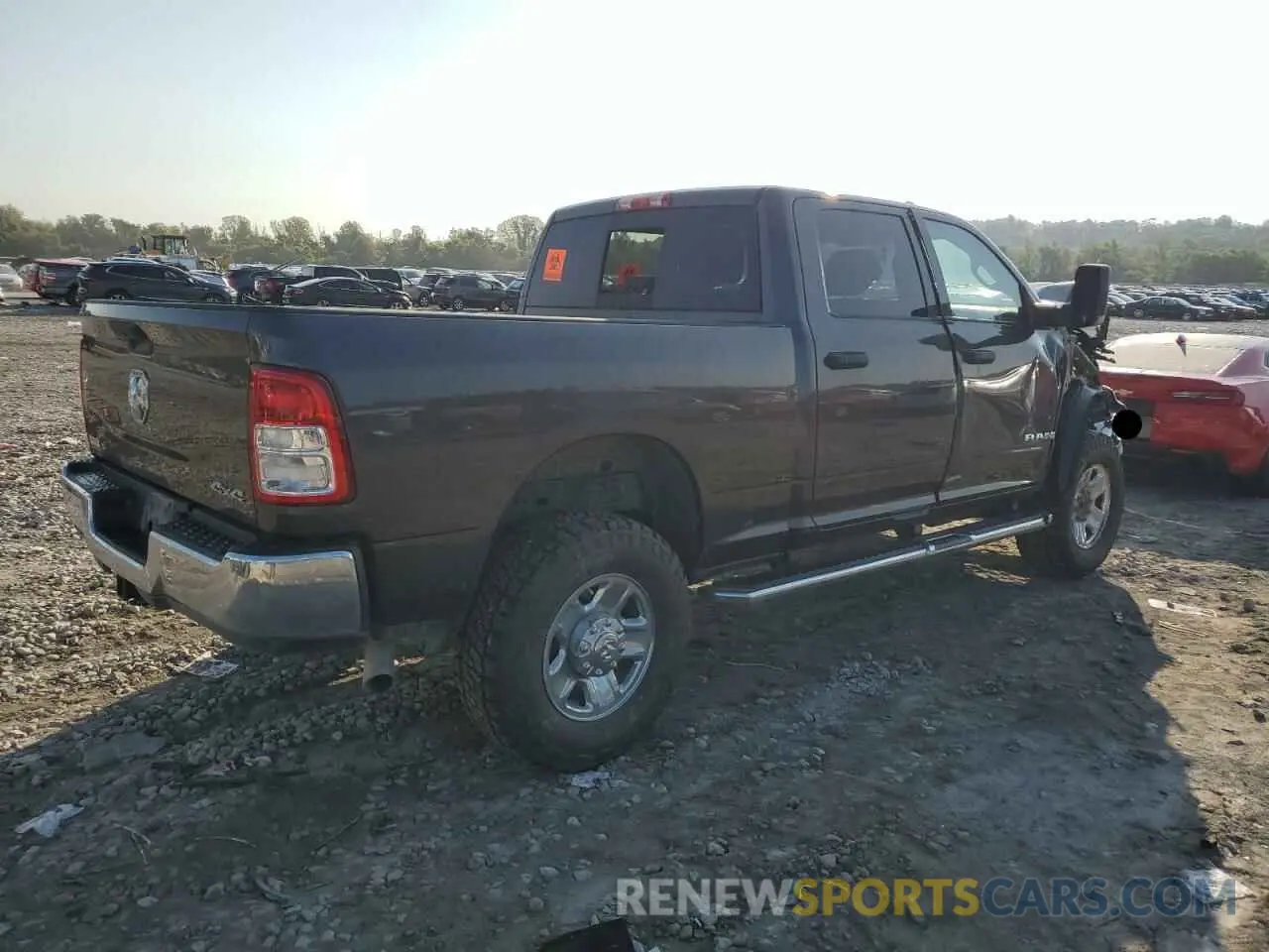 3 Photograph of a damaged car 3C6UR5CJ6KG553668 RAM 2500 2019