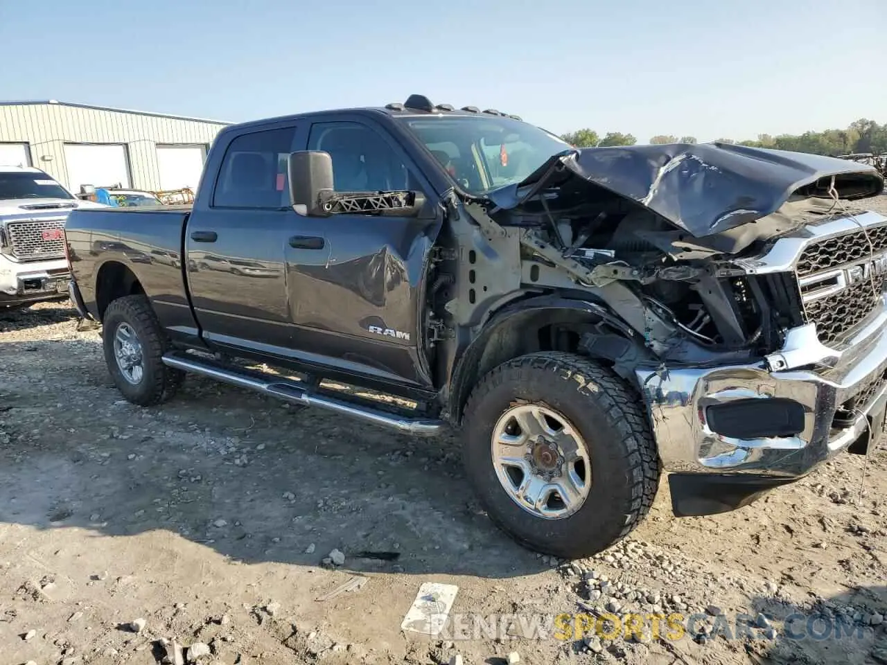 4 Photograph of a damaged car 3C6UR5CJ6KG553668 RAM 2500 2019