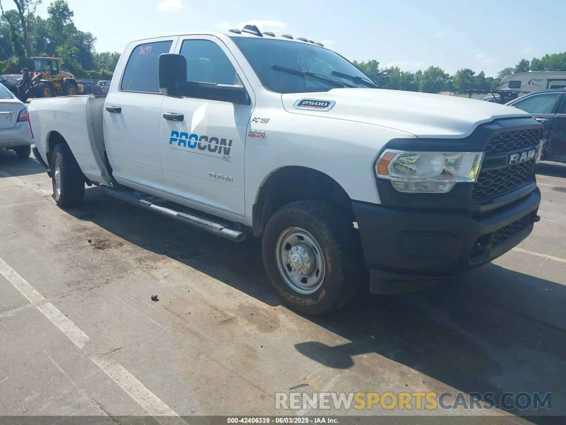 1 Photograph of a damaged car 3C6UR5CJ6KG556859 RAM 2500 2019