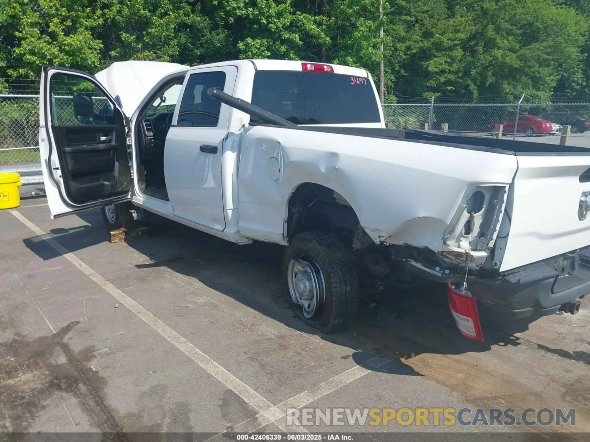 3 Photograph of a damaged car 3C6UR5CJ6KG556859 RAM 2500 2019