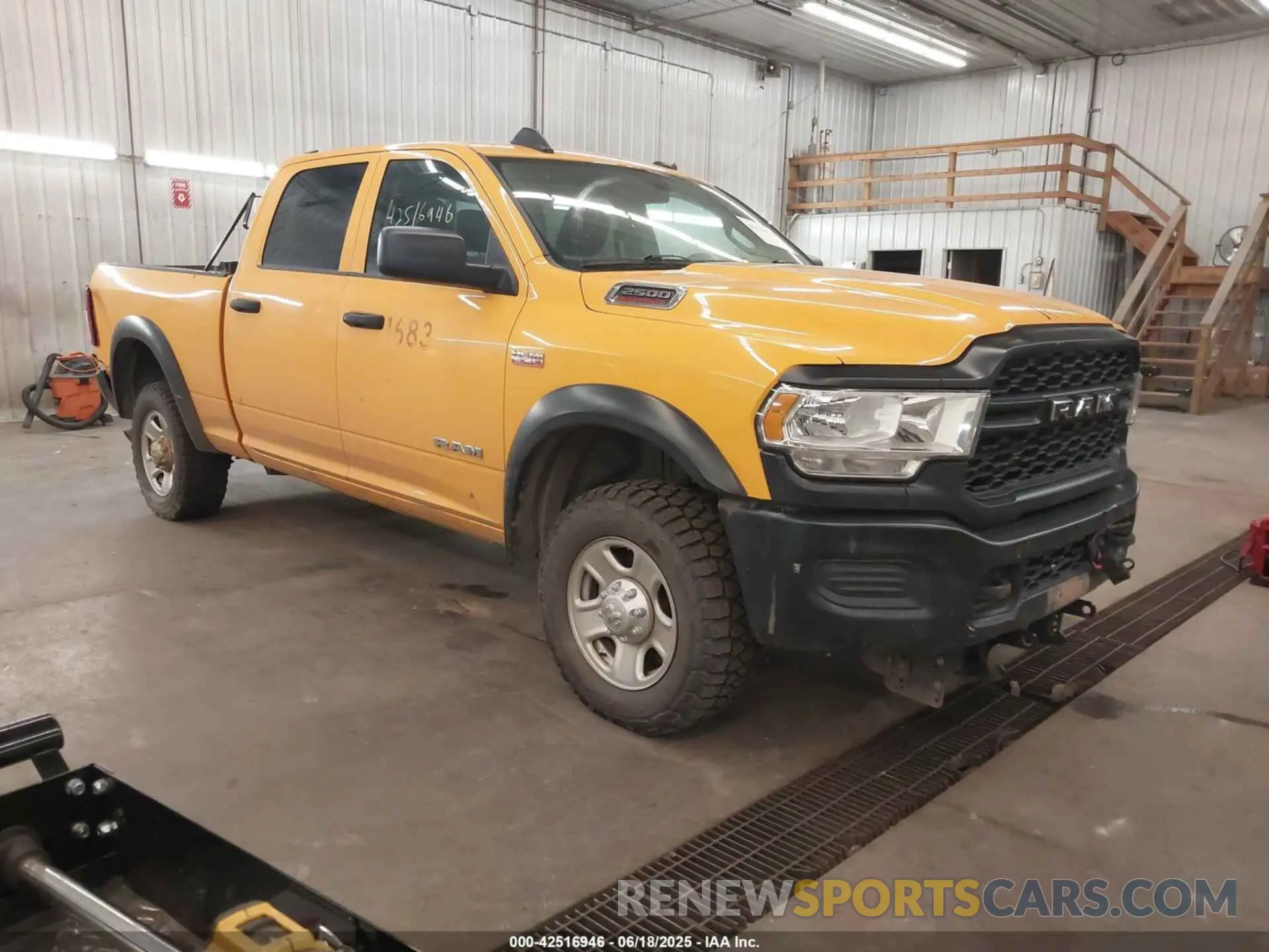 1 Photograph of a damaged car 3C6UR5CJ6KG620320 RAM 2500 2019
