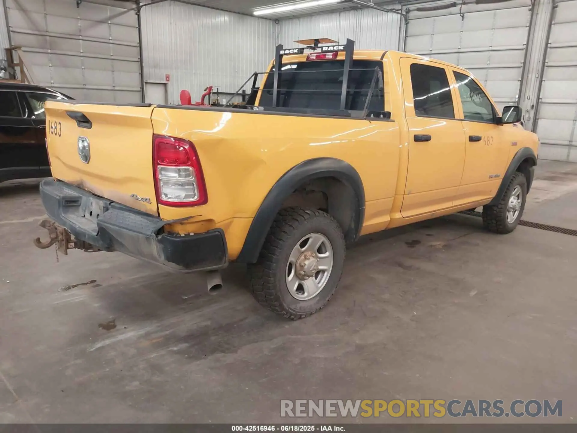 4 Photograph of a damaged car 3C6UR5CJ6KG620320 RAM 2500 2019
