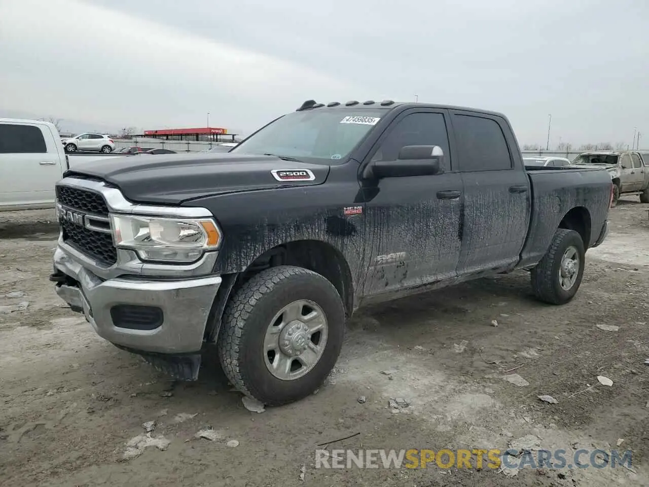 1 Photograph of a damaged car 3C6UR5CJ6KG633486 RAM 2500 2019
