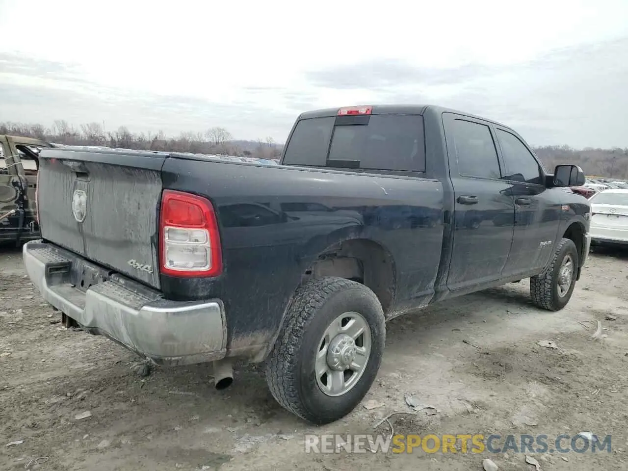 3 Photograph of a damaged car 3C6UR5CJ6KG633486 RAM 2500 2019