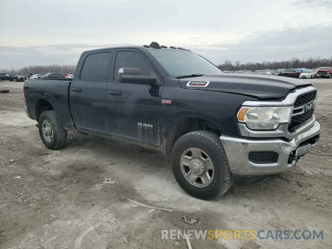 4 Photograph of a damaged car 3C6UR5CJ6KG633486 RAM 2500 2019