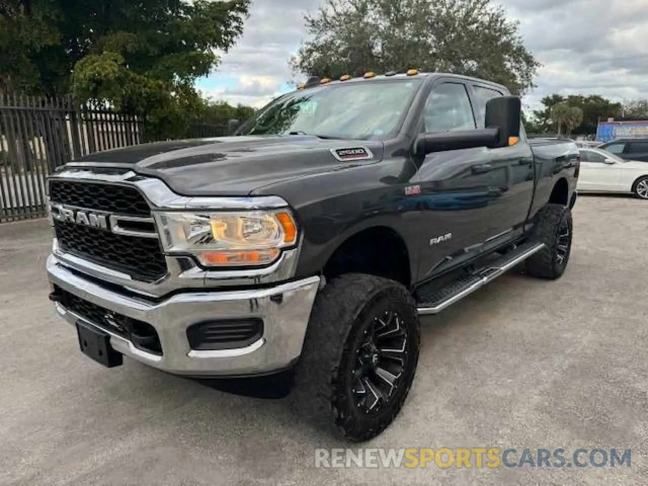 1 Photograph of a damaged car 3C6UR5CJ6KG710051 RAM 2500 2019